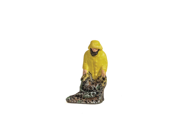 Fisherman in Yellow Oilskins with Net